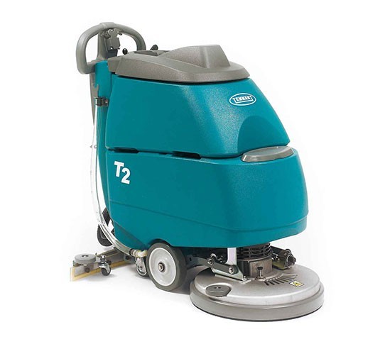Tennant T2 walk-behind compact floor scrubber, front three-quarter view showing the 17 in disk scrub head
