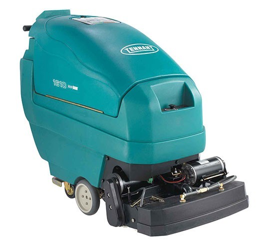 Tennant 1610 walk-behind dual technology carpet cleaner, front three-quarter view showing the cleaning head and rollers