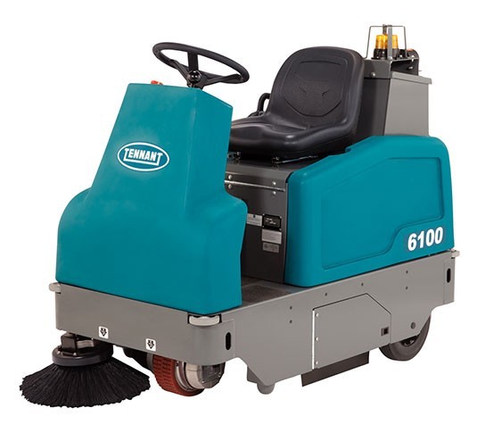Tennant 6100 battery rider sweeper, left side view showing the operator seat, steering wheel and side brush