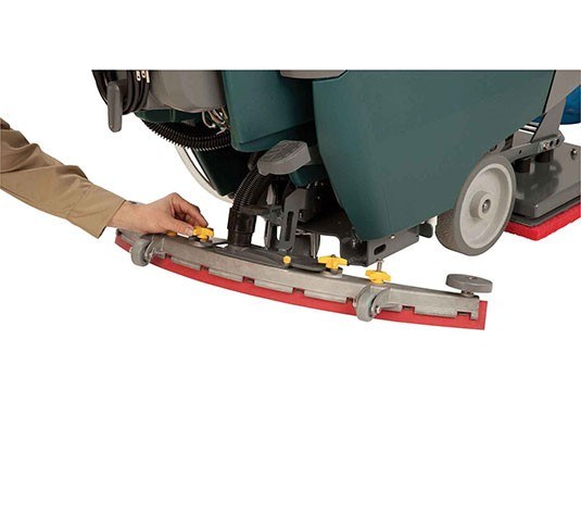 Technician removing the Nobles Speed Scrub 300 rear squeegee assembly by hand without tools