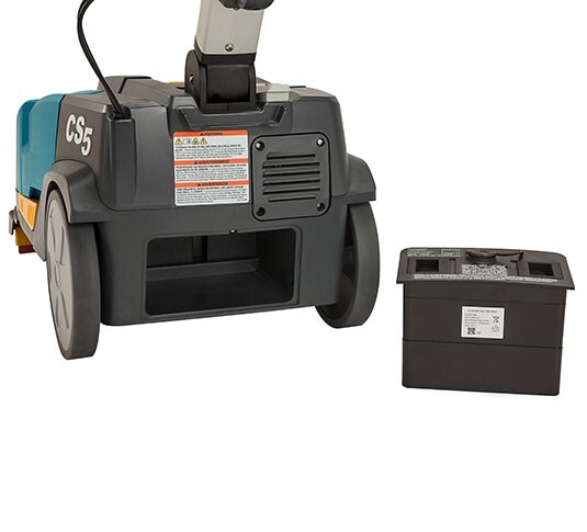 Tennant CS5 with the removable lithium-ion battery pack beside it