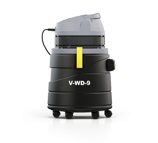 Tennant V-WD-9 wet/dry vacuum, side view showing the tank, swivel wheels and model label