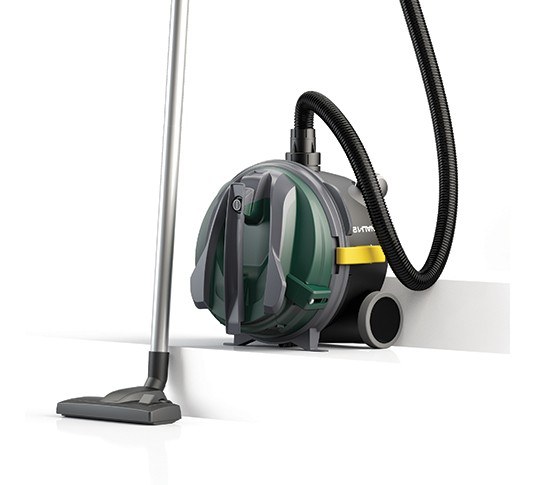 Nobles Denali-12 canister vacuum parked on a stair landing with the wand and floor tool on the step