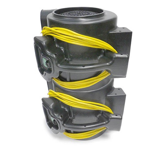 Two Tennant blowers stacked on top of each other for storage
