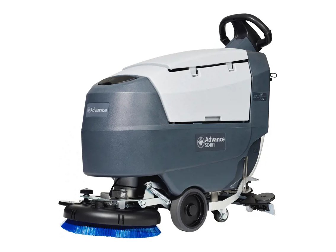 Advance SC401 compact walk-behind floor scrubber with blue disc brush, left side view