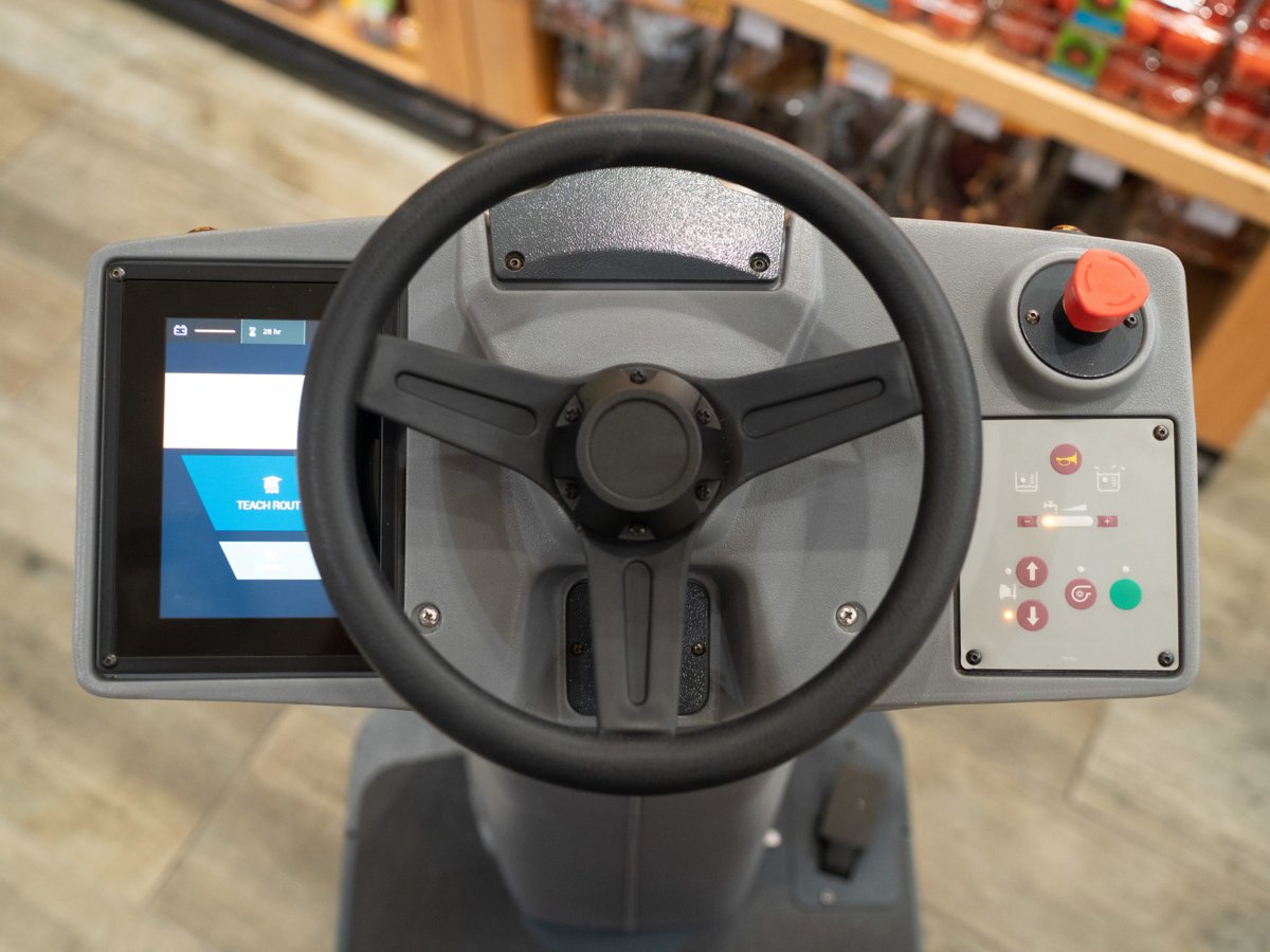 Minuteman RoboScrub 20 operator station with touch screen and steering wheel