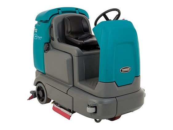 Tennant T12 compact battery ride-on floor scrubber, front right view